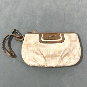 Spring Cleaning Find: Pristine Coach Wristlet in Beige